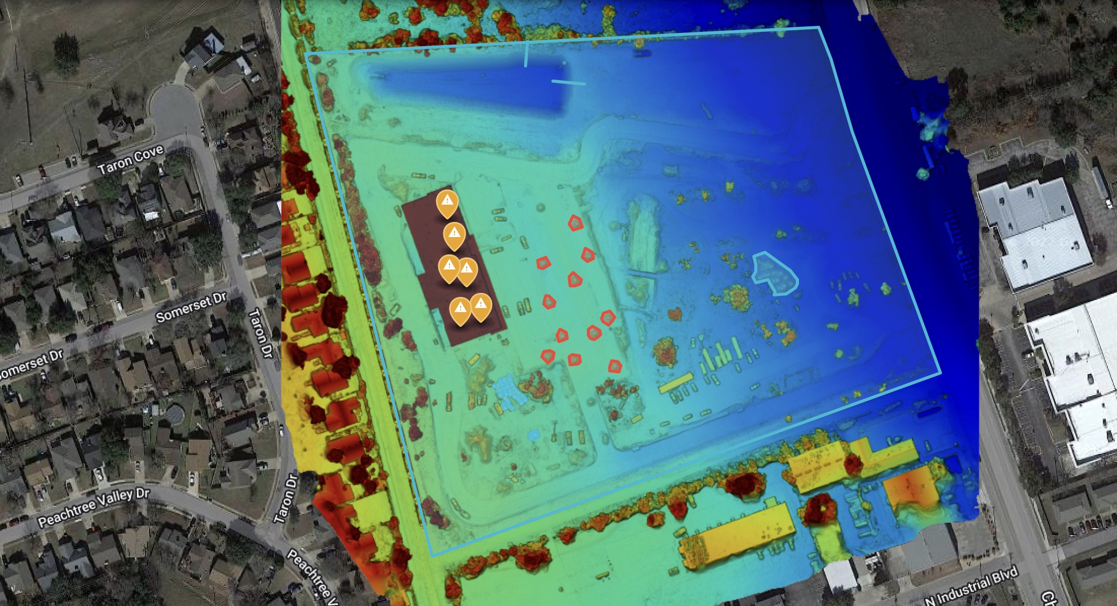 Elevation heatmap with a boundary polygon and highlighted site features.