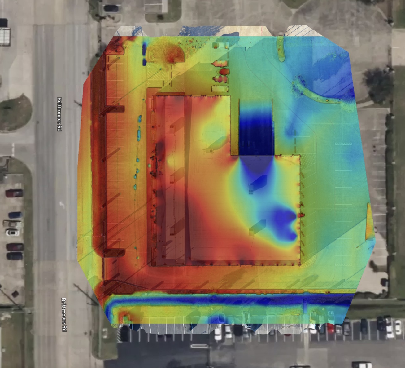 Elevation heatmap overlay on a building site showing height variation.