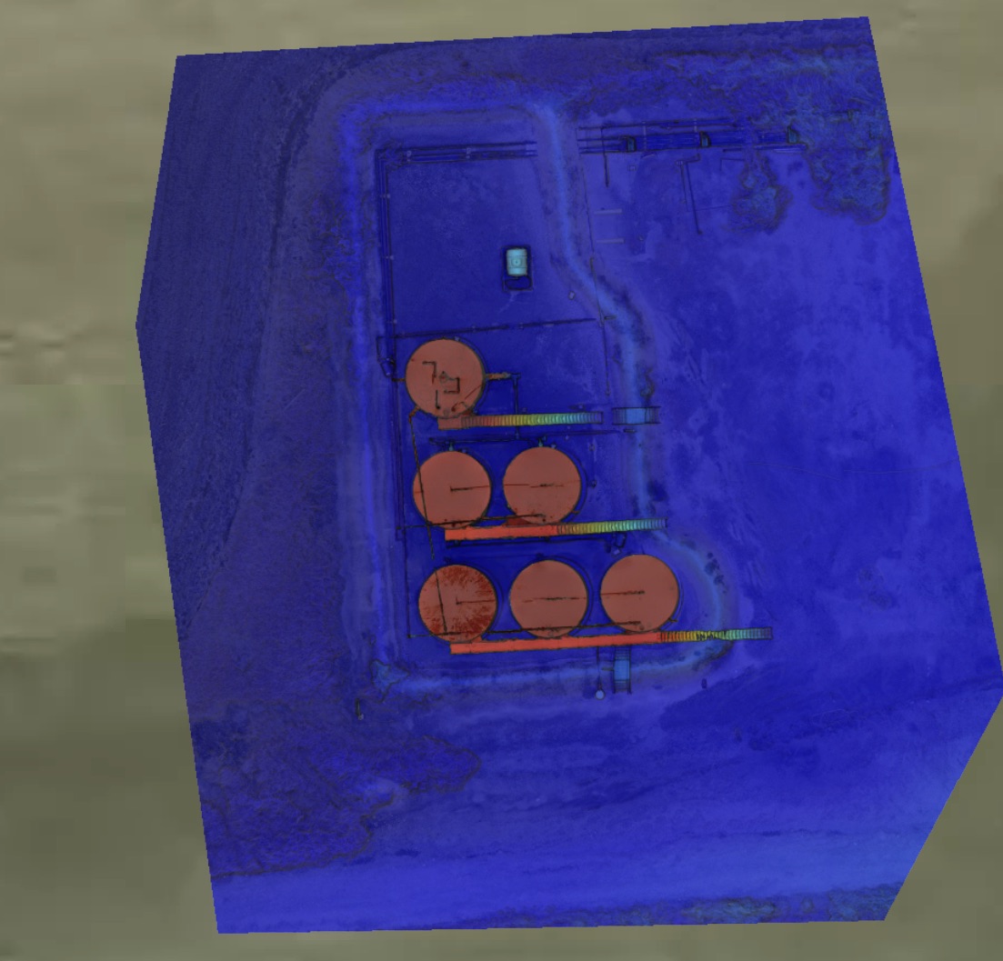 Elevation color map over a tank farm highlighting berms and surface slopes.