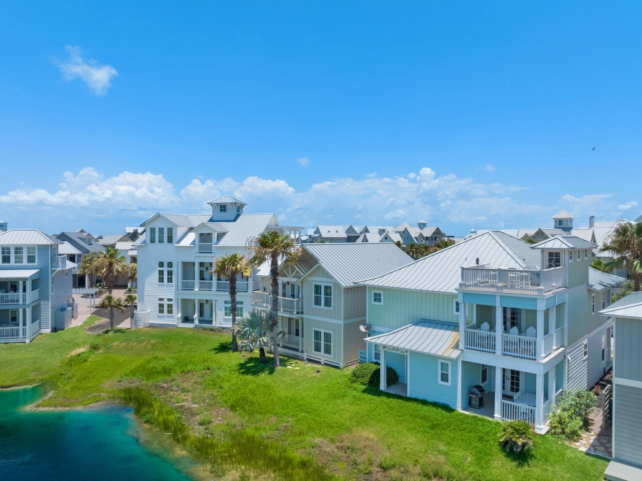 Aerial view of coastal homes and condos on the water