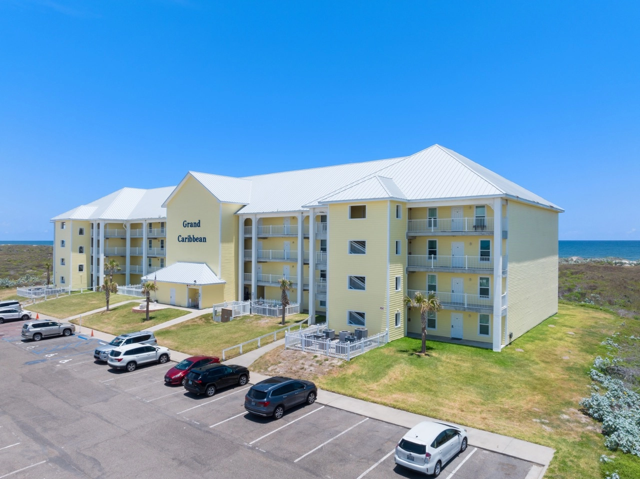 Grand Caribbean condo building exterior in Port Aransas