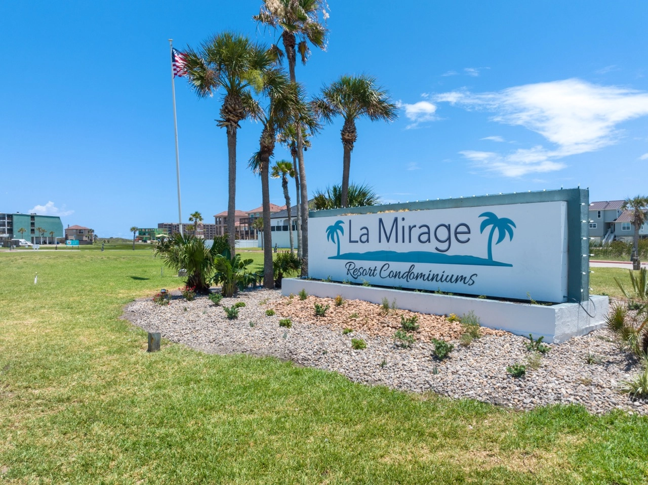 La Mirage Resort Condominiums entrance sign with palm trees