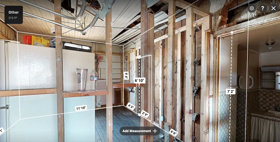 Interior circulation view showing the 11 ft 10 in span, doorway heights, opening widths, and adjoining wall relationships.