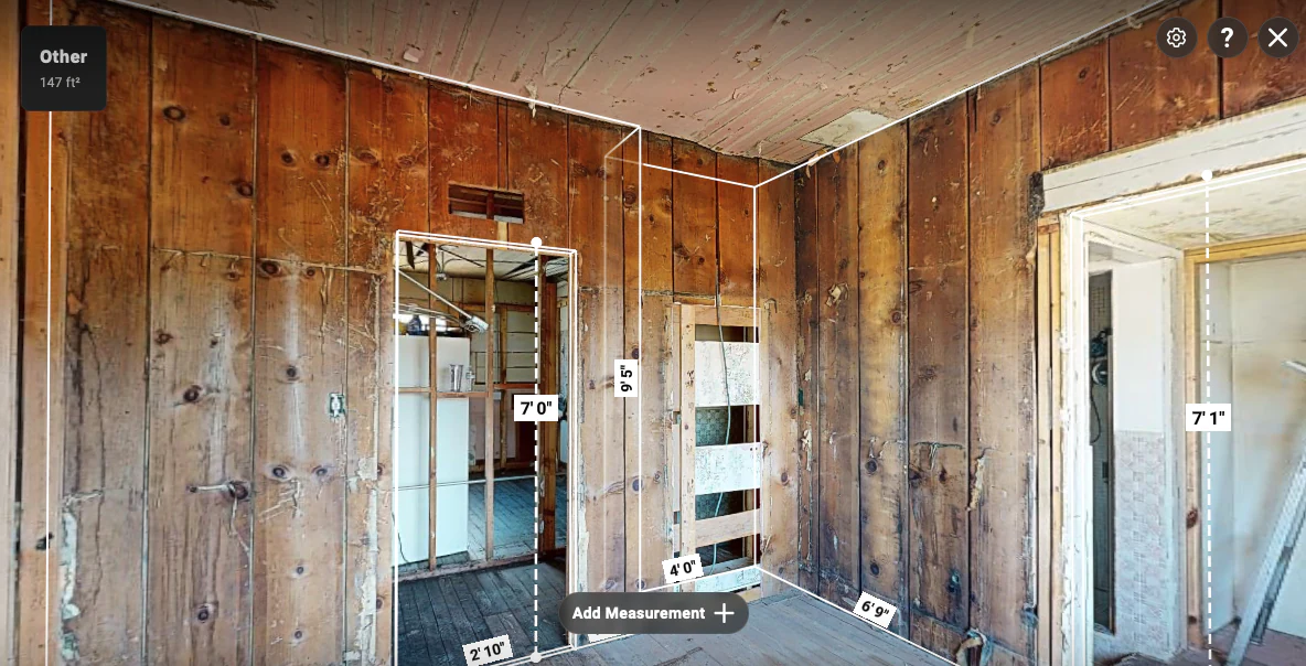 Opposite room view connecting a 9 ft 5 in wall height with two measured doorway openings and adjacent wall spans.