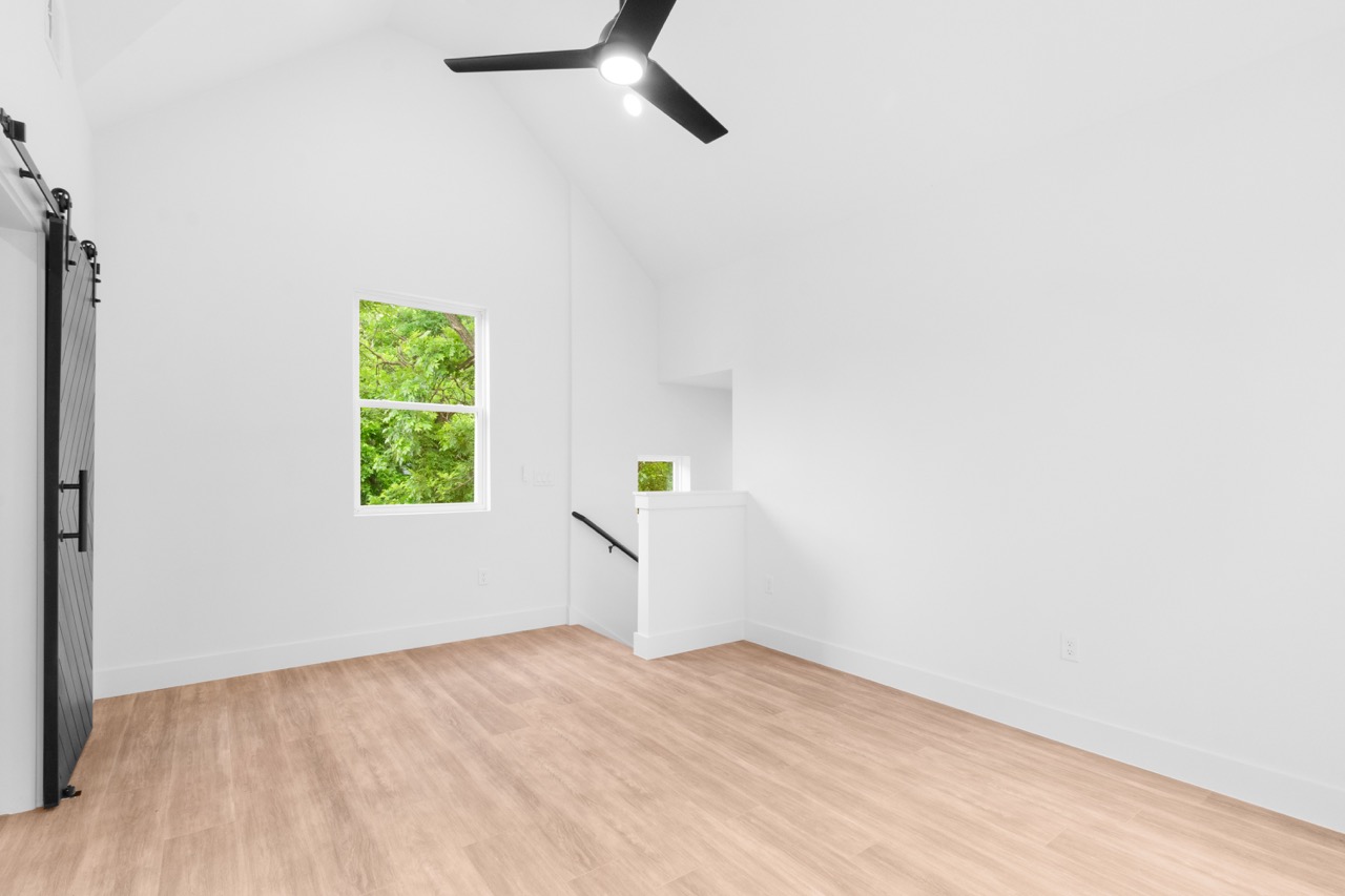 High Ceiling Room with Small Window