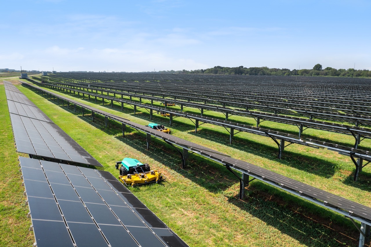 A close-up view of solar panels in a field in San Antonio Texas