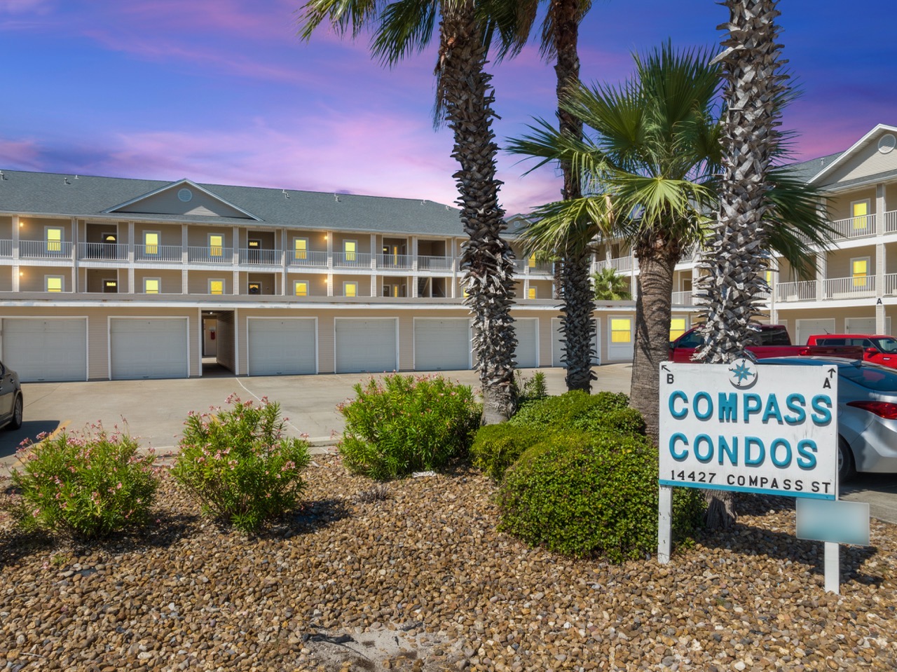 Compass Condos sign and building exterior in Corpus Christi Texas