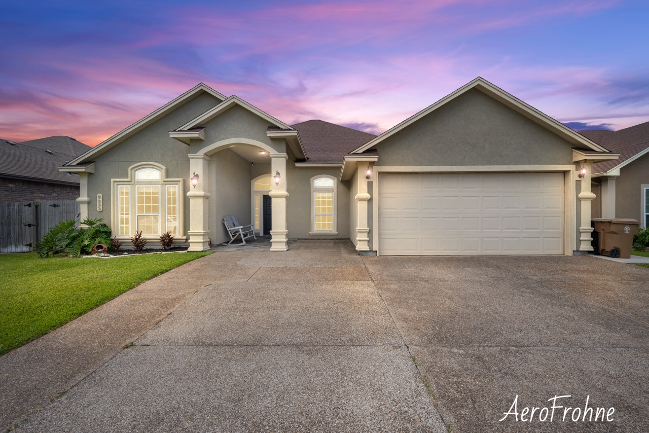 Twilight exterior of single-family home
