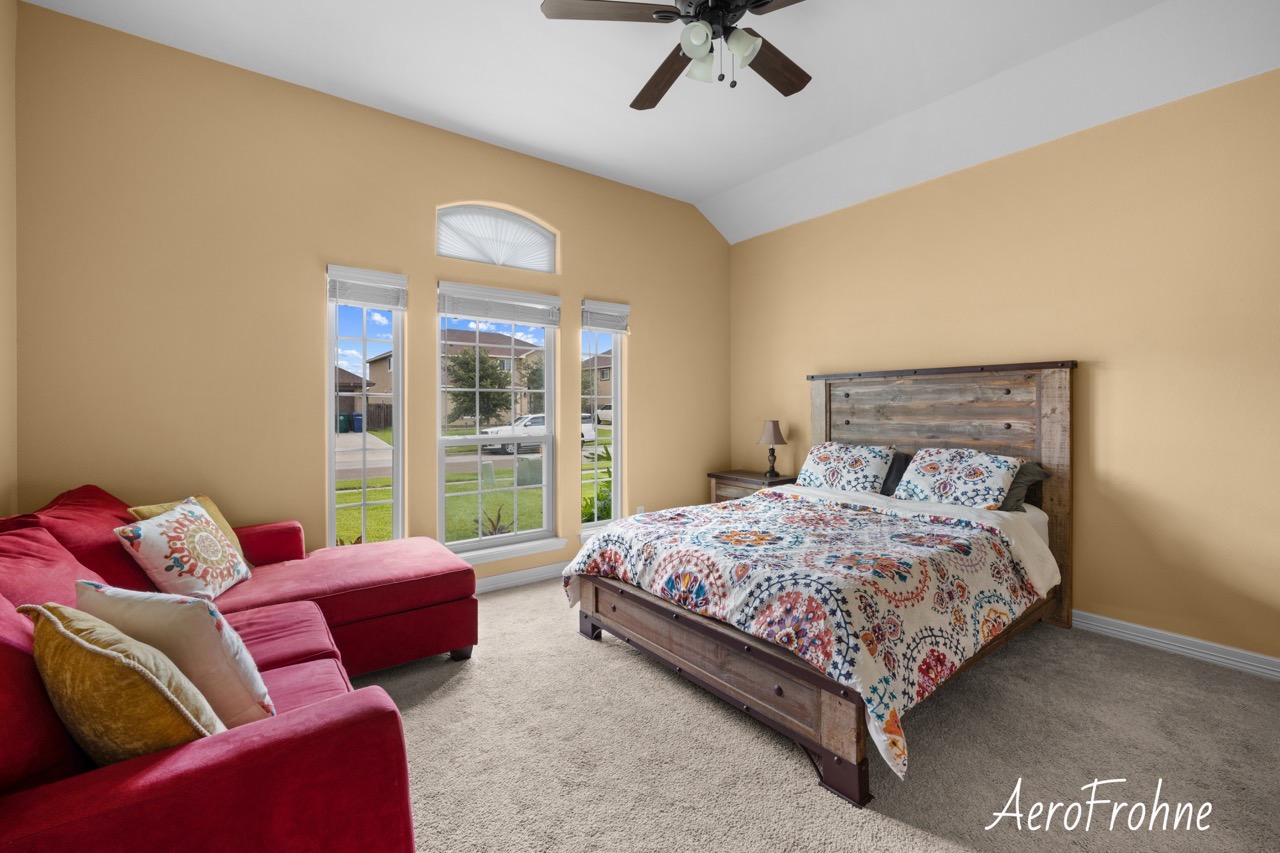 Interior bedroom with bed and seating