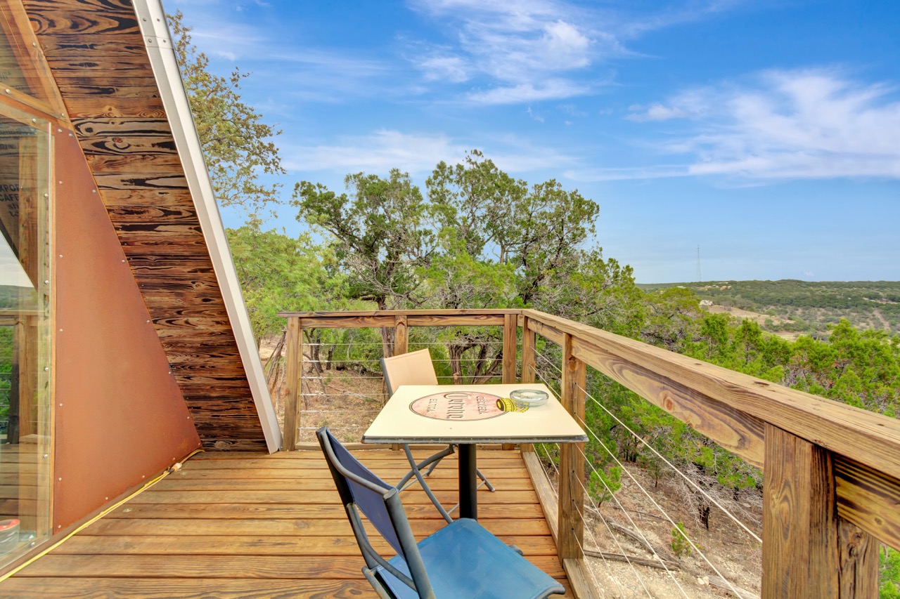 Exterior wooden deck with seating