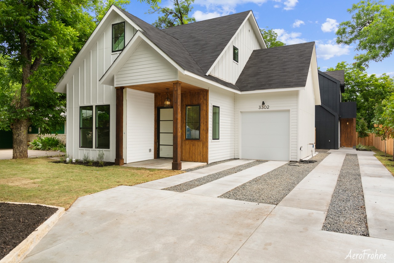 Exterior modern home with driveway