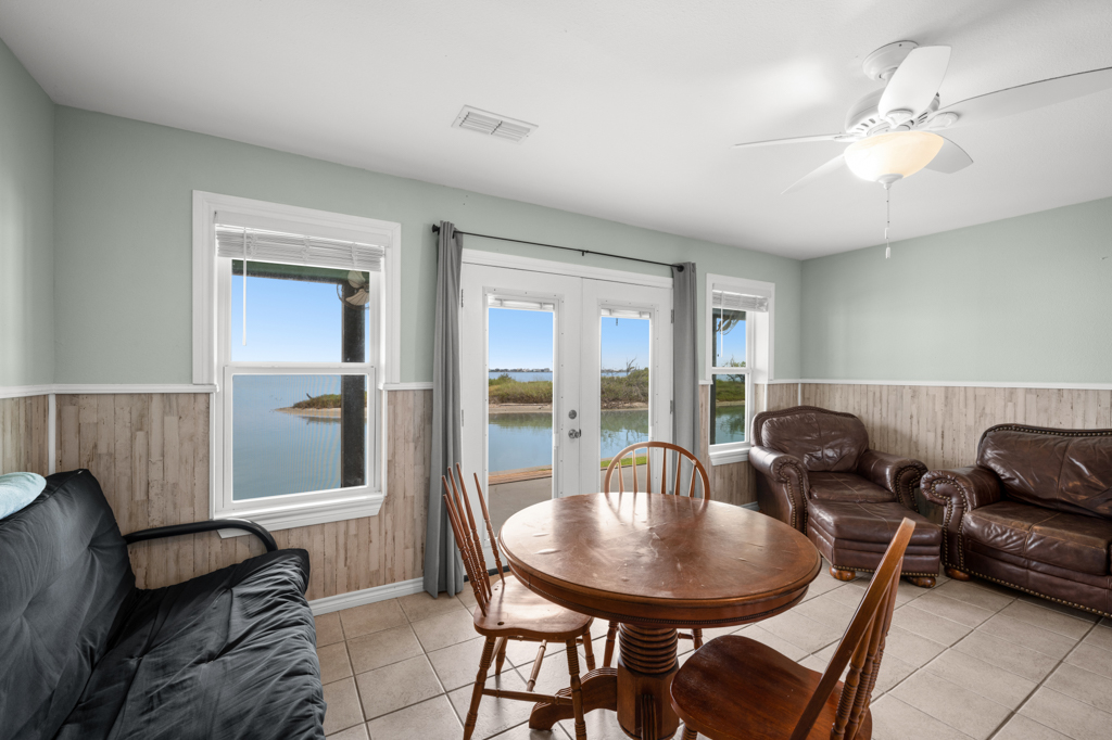 Sunroom seating area with game table